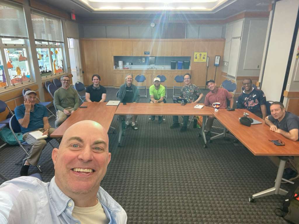 A room of business owners at a hands-on AI workshop